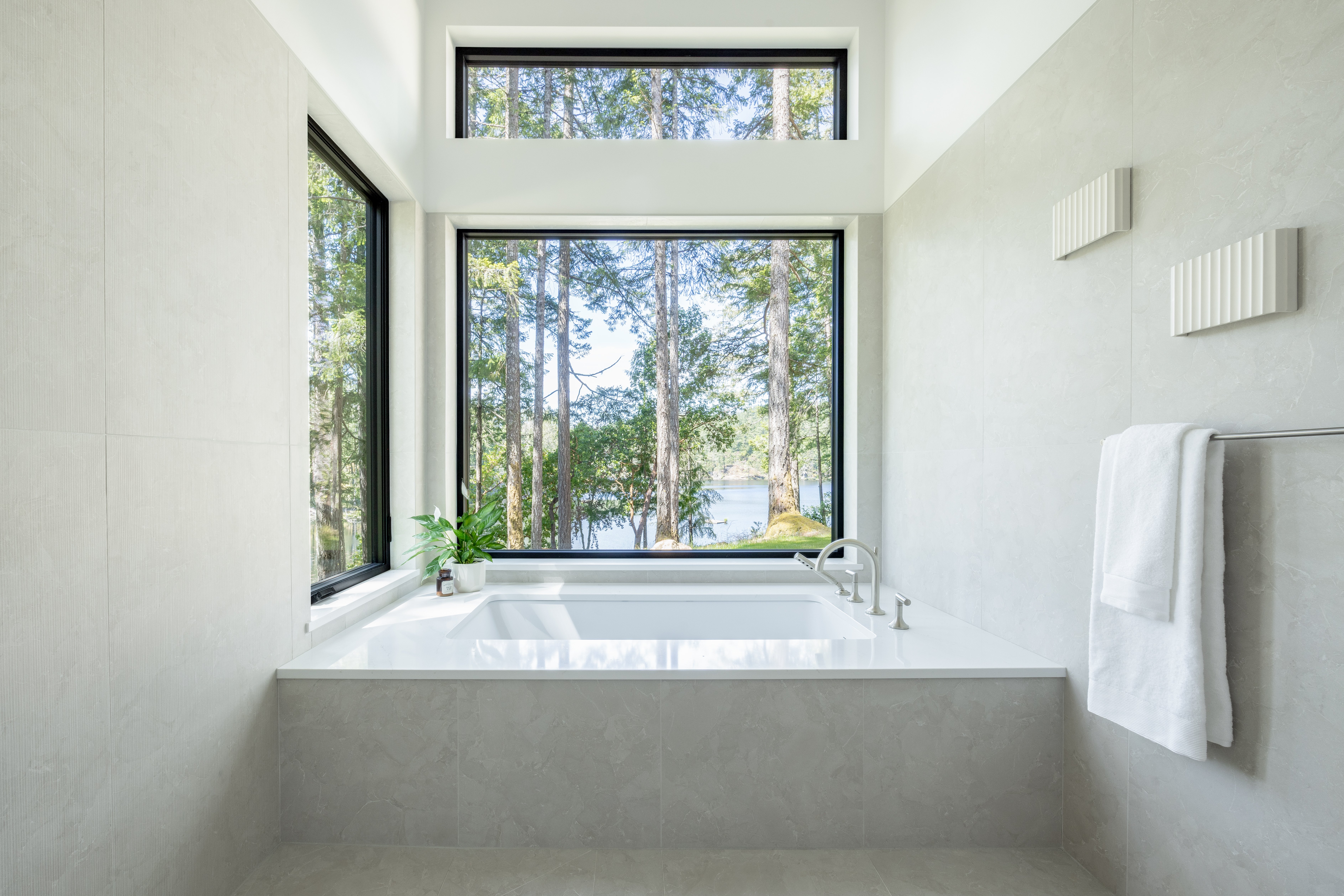 master bath tub surrounded by windows