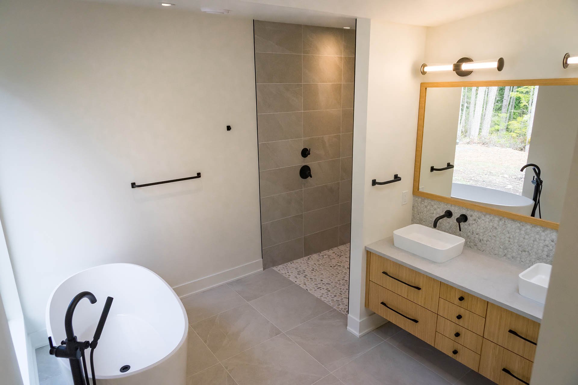 Bathroom with Freestanding Soaking Tub and Dual Vanity