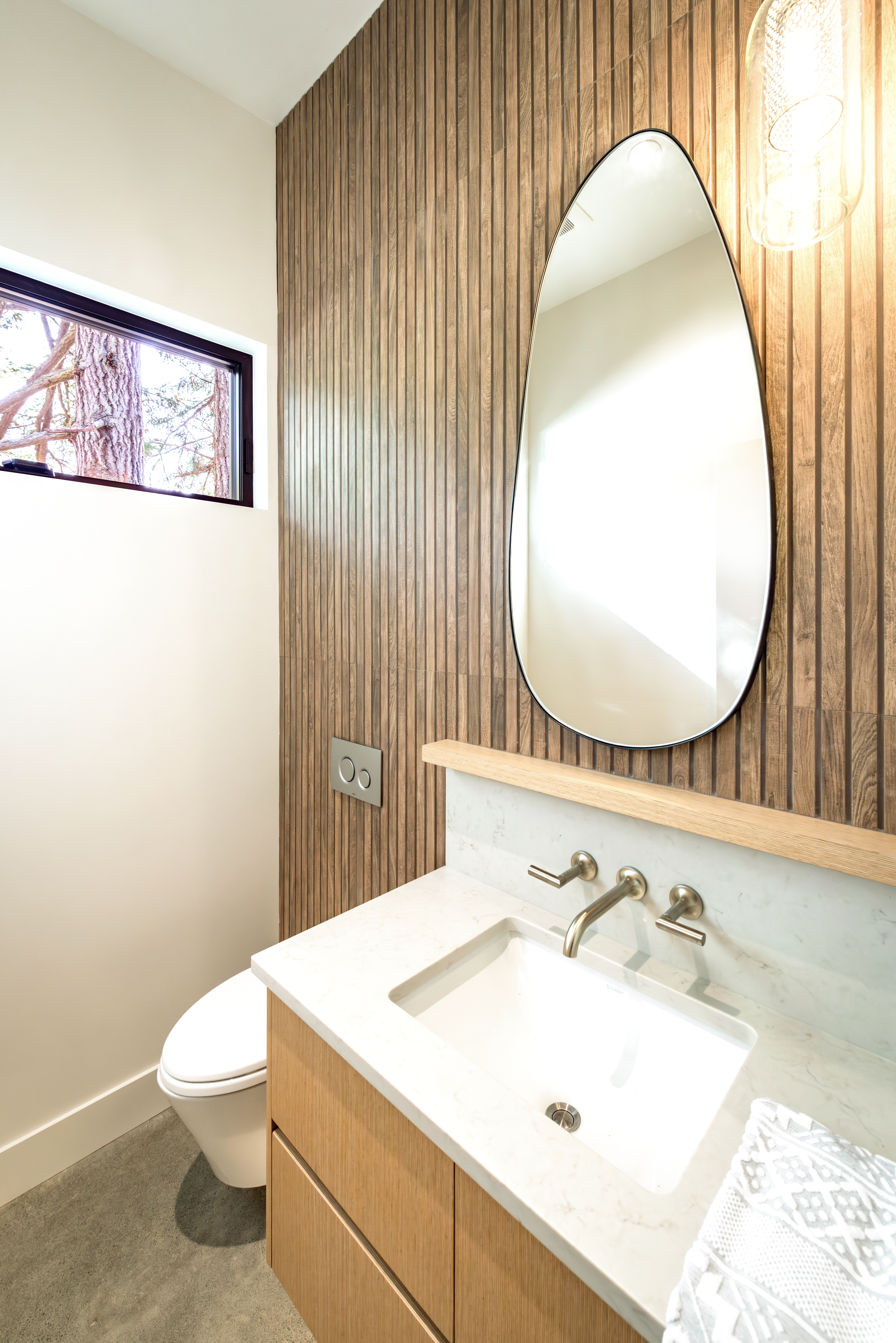 walnut feature wall guest bath